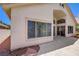 Beautiful exterior with large windows and a patio area perfect for entertaining at 2149 Eaglepath Cir, Henderson, NV 89074