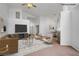 Bright living room featuring neutral decor, a high ceiling, and ample natural light at 2149 Eaglepath Cir, Henderson, NV 89074