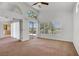 Bright living room with sliding glass door leading to patio at 2149 Eaglepath Cir, Henderson, NV 89074