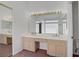 The main bathroom includes dual sinks, lots of cabinetry, and a privacy block window at 2149 Eaglepath Cir, Henderson, NV 89074