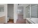 The main bathroom has a separate shower and garden tub and a view into the main bedroom at 2149 Eaglepath Cir, Henderson, NV 89074