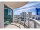Balcony view with sliding glass door, showing high-rise buildings and city landscape at 222 Karen Ave # 2308, Las Vegas, NV 89109