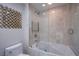 Modern bathroom featuring a bathtub and a glass-enclosed shower with tile surround at 222 Karen Ave # 2308, Las Vegas, NV 89109
