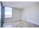 Bedroom with tile floors and a large window with city views at 222 Karen Ave # 2308, Las Vegas, NV 89109