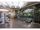 Brightly lit gym featuring treadmills and weight machines with large windows looking outside at 222 Karen Ave # 2308, Las Vegas, NV 89109