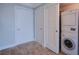 Bright hallway with modern washer/dryer and ample closet space at 222 Karen Ave # 2308, Las Vegas, NV 89109