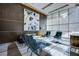 Bright lobby seating area features modern chairs, neutral sofa, and large windows with natural light at 222 Karen Ave # 2308, Las Vegas, NV 89109