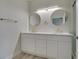 Bathroom featuring double sinks, stylish lighting and gold hardware at 2251 Wigwam Pkwy # 716, Henderson, NV 89074