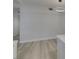 Neutral living space is open and airy, with light wood-look floors and neutral walls at 2251 Wigwam Pkwy # 716, Henderson, NV 89074