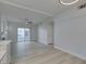 Bright, open living room and dining area, with sleek flooring and a modern ceiling fan at 2251 Wigwam Pkwy # 716, Henderson, NV 89074