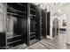 Walk-in closet with multiple compartments and open doors to allow for easy access at 2407 Ridgeline Wash St, Las Vegas, NV 89138