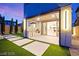 The backyard features an outdoor kitchen and patio space with artificial turf at 2407 Ridgeline Wash St, Las Vegas, NV 89138