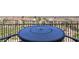 Cozy outdoor balcony area with a stylish table and scenic community views at 2555 Hampton Rd # 7304, Henderson, NV 89052