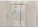 Modern glass shower enclosure with sleek fixtures, complemented by neutral walls and a clean, contemporary design at 2555 Hampton Rd # 7304, Henderson, NV 89052