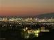 Beautiful sunset view of the Las Vegas skyline, highlighting the vibrant city lights against the horizon at 2555 Hampton Rd # 7304, Henderson, NV 89052