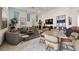 This community room has multiple seating areas and natural light at 2555 Hampton Rd # 7304, Henderson, NV 89052