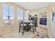 Bright dining area featuring a modern table, comfortable seating, and views of an adjacent bedroom at 2555 Hampton Rd # 7304, Henderson, NV 89052