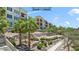 Beautiful condo building with landscaped grounds and walking paths in a resort-style community at 2555 Hampton Rd # 7304, Henderson, NV 89052