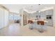 Spacious kitchen features stainless appliances, gray cabinetry, and a nearby dining area at 2555 Hampton Rd # 7304, Henderson, NV 89052