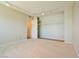 Bedroom includes built in shelves and a closet at 2614 Capistrano Ave, Las Vegas, NV 89121