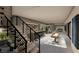 Finished basement with bar, shuffleboard and staircase, ideal for entertainment and relaxation at 2655 Juniper Branch St, Las Vegas, NV 89117