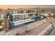 Aerial perspective of the modern home showcasing its hillside setting and outdoor features at 2695 Ponte Vecchio Ter, Henderson, NV 89052
