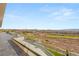 This expansive backyard has desert and golf course views with neighborhood homes in the distance at 2695 Ponte Vecchio Ter, Henderson, NV 89052