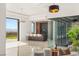 Stylish bar area featuring modern stools, elegant lighting, and a glass-enclosed wine storage at 2695 Ponte Vecchio Ter, Henderson, NV 89052