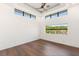 The bedroom features wood floors and lots of natural light at 2695 Ponte Vecchio Ter, Henderson, NV 89052