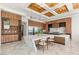 Bright kitchen with a marble island and wood cabinets at 2695 Ponte Vecchio Ter, Henderson, NV 89052