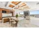 Gourmet kitchen with marble island, designer lighting, and seamless access to the living space at 2695 Ponte Vecchio Ter, Henderson, NV 89052