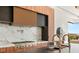 Designer kitchen with modern cabinetry, stainless steel appliances, and marble countertops at 2695 Ponte Vecchio Ter, Henderson, NV 89052