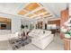 A spacious living room features modern decor and open floor plan, with an eye-catching wooden ceiling at 2695 Ponte Vecchio Ter, Henderson, NV 89052
