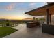 Spacious outdoor kitchen with grill, countertop, and stunning views, ideal for entertaining guests at 2695 Ponte Vecchio Ter, Henderson, NV 89052