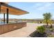 An outdoor kitchen is perfect for entertaining with mountain views, a grill, and outdoor dining at 2695 Ponte Vecchio Ter, Henderson, NV 89052