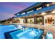 Backyard pool area with hot tub and covered patio space for outdoor lounging and relaxation at 2695 Ponte Vecchio Ter, Henderson, NV 89052