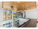 A modern staircase with glass railings offers scenic views and a stylish design at 2695 Ponte Vecchio Ter, Henderson, NV 89052