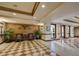 Well-maintained lobby with decorative tile flooring, elegant seating and ornate decor at 30 Strada Di Villaggio # 429, Henderson, NV 89011