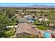 Aerial view of home showcasing large lot with pool, patio, and mature trees at 3104 Conners Dr, Las Vegas, NV 89107