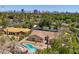 Beautiful pool, scenic landscaping, and spacious layout, offering a tranquil outdoor oasis with many desirable features at 3104 Conners Dr, Las Vegas, NV 89107