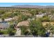 Desirable property featuring lush backyard, mature trees and convenient access to nearby parks, dining, and shops at 3104 Conners Dr, Las Vegas, NV 89107