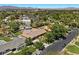 Aerial view showcasing the home's mature trees, a pool, and a well-maintained lawn at 3104 Conners Dr, Las Vegas, NV 89107