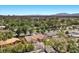 Spacious suburban property showcasing lush greenery, mature trees, and neighborhood charm, perfect for serene living at 3104 Conners Dr, Las Vegas, NV 89107
