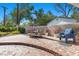 Backyard patio with outdoor dining set and seating area at 3104 Conners Dr, Las Vegas, NV 89107