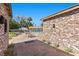 Lush backyard featuring brickwork, landscaping, and a pool house at 3104 Conners Dr, Las Vegas, NV 89107