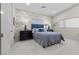 Cozy bedroom featuring patterned wallpaper, soft blue bedding, and contemporary bedside tables at 3104 Conners Dr, Las Vegas, NV 89107