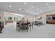 Open-concept area with dual dining spaces connected to a living room and kitchen at 3104 Conners Dr, Las Vegas, NV 89107