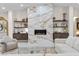 Modern living room featuring a stunning marble fireplace and stylish decor at 3104 Conners Dr, Las Vegas, NV 89107