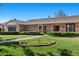 Well-maintained brick home with a manicured lawn and neat hedges at 3104 Conners Dr, Las Vegas, NV 89107