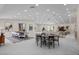 Expansive open-concept living area with hardwood floors, recessed lighting, and a cozy seating arrangement at 3104 Conners Dr, Las Vegas, NV 89107